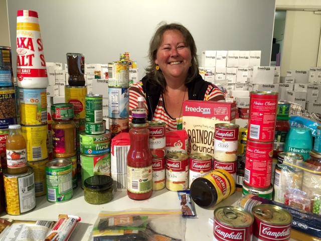 Sarah Goffman experimenting with the first deliveries of her "paint" - household good and non perishable food